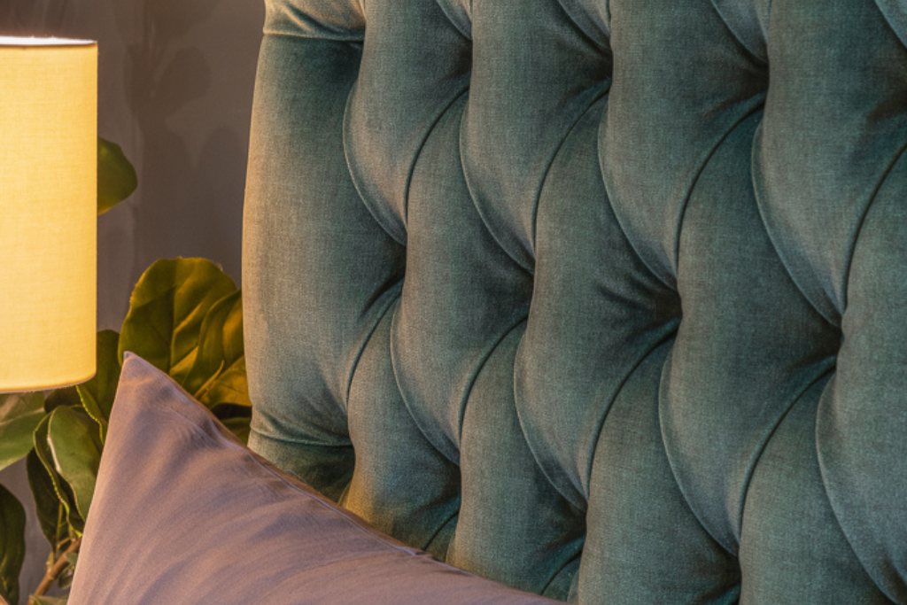 And So To Bed Emilia Grand Bed close-up of the deep buttoning on the velvet headboard
