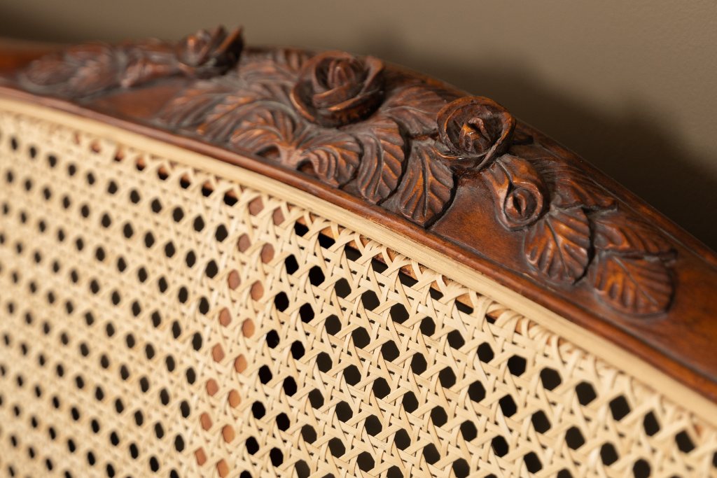 And So To Bed Louis XV Caned Bed close-up of the carved roses and woven cane
