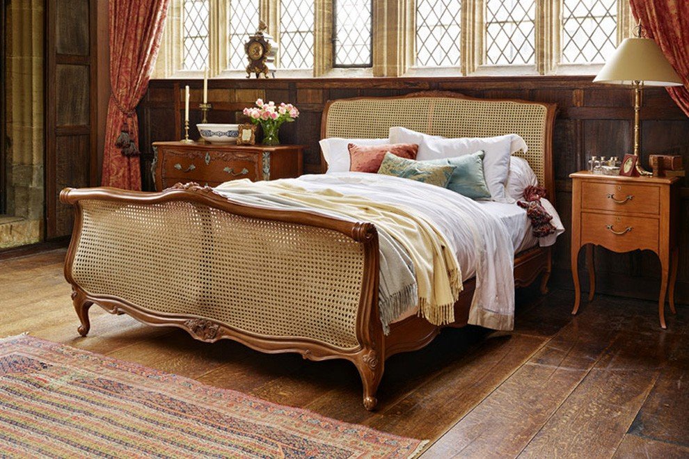 And So To Bed Louis XV Caned Bed in a panelled room with leaded windows