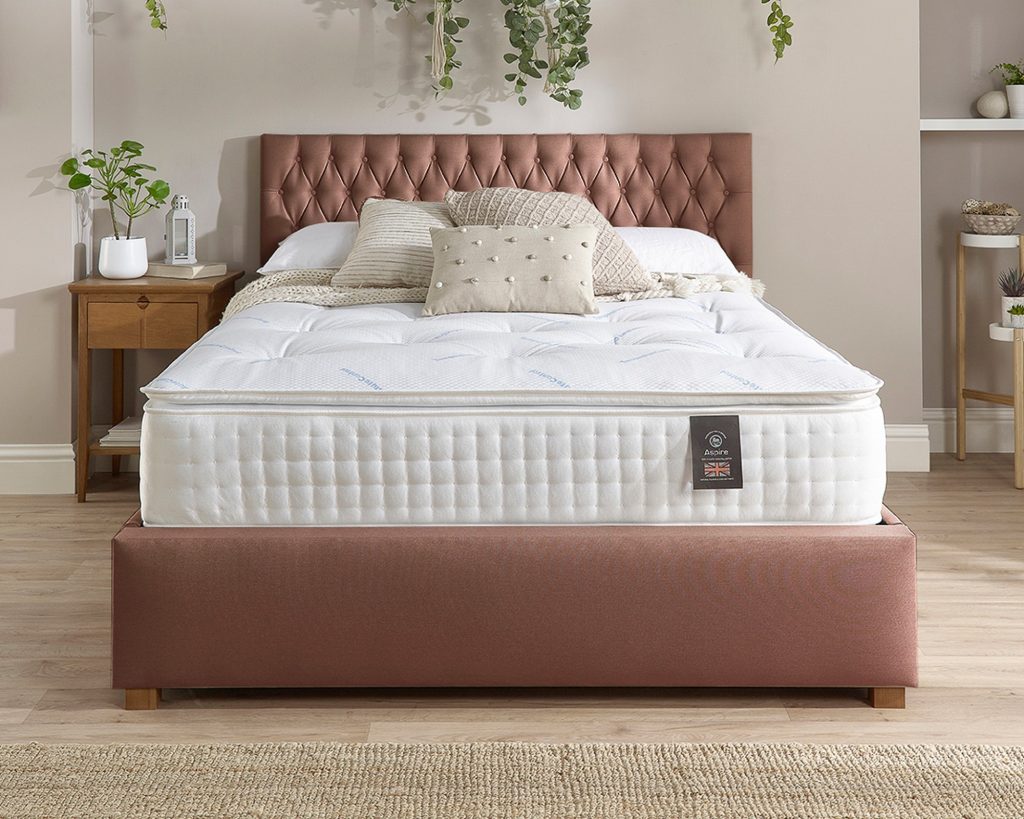 Aspire 3000 Pocket Climate Cool Wool Pillowtop on a pink bed, front view