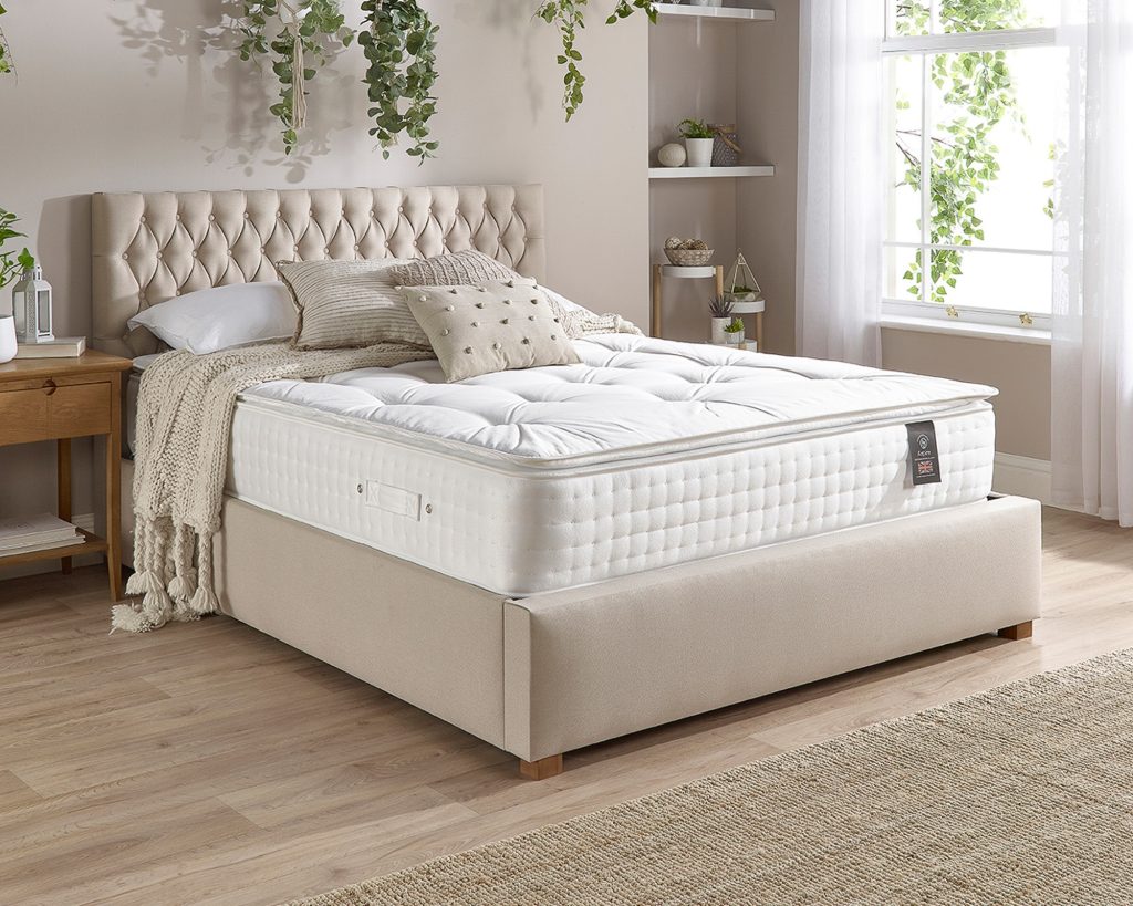 Aspire 3000 Pocket Wool Cashmere and Silk Pillowtop on a cream bed in a bright bedroom