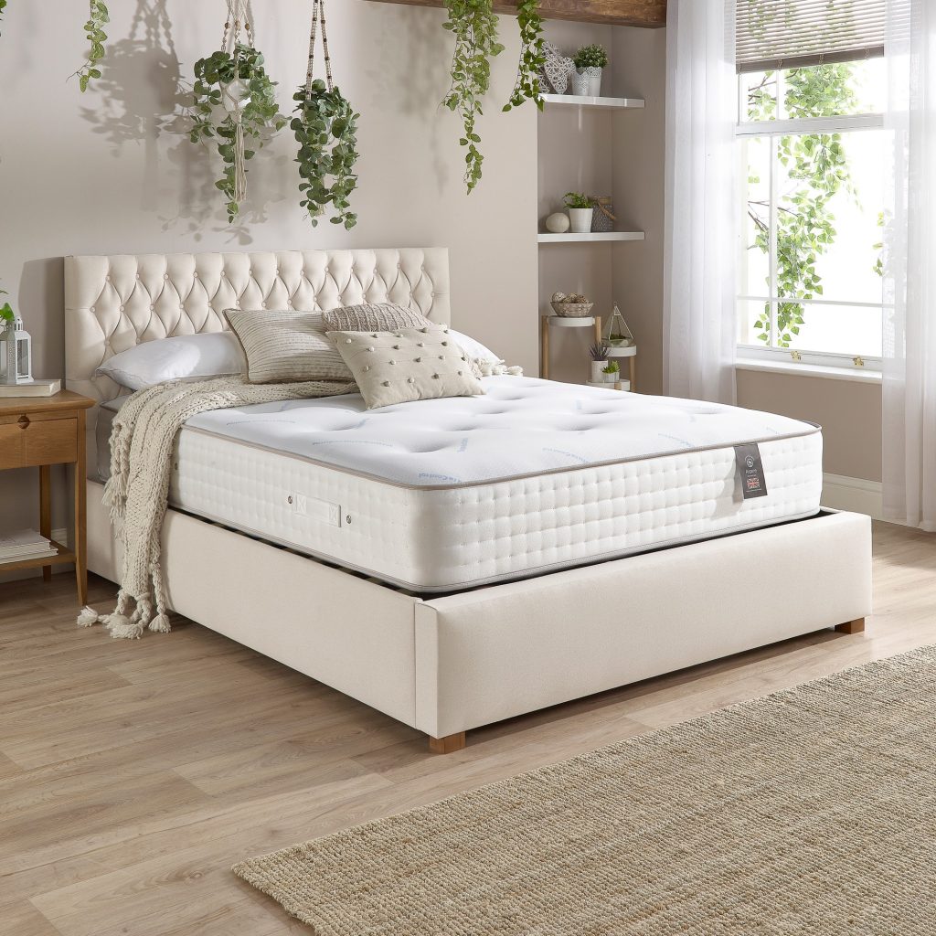 Aspire 5000 Pocket Climate Cool Wool Dual Sided mattress on a cream upholstered bed