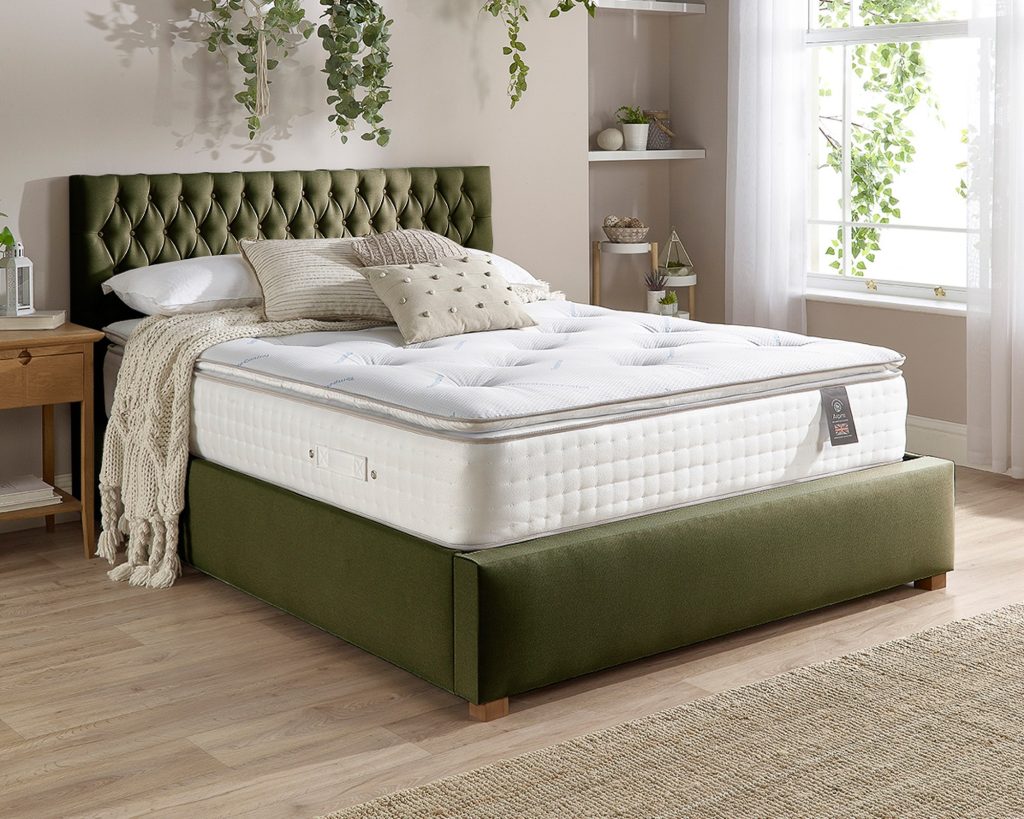 Aspire 5000 Pocket Climate Cool Wool Pillowtop on a green upholstered bed