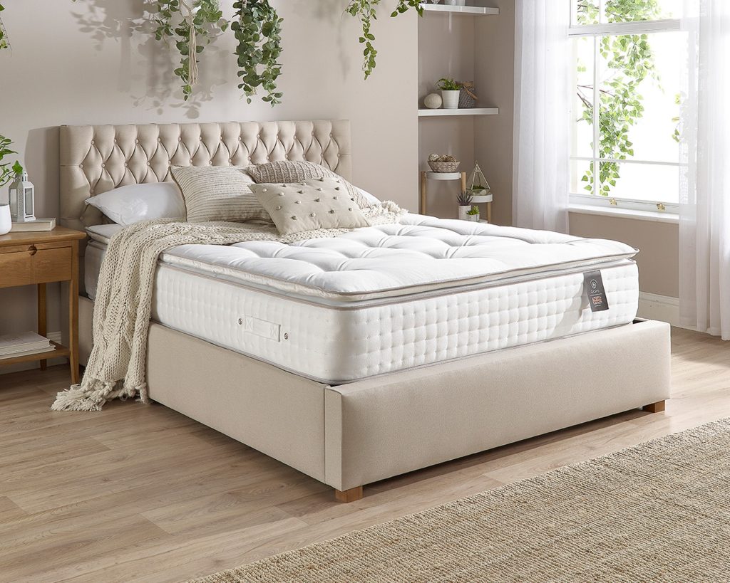 Aspire 5000 Pocket Wool Cashmere and Silk Pillowtop on a cream bed in a bright bedroom