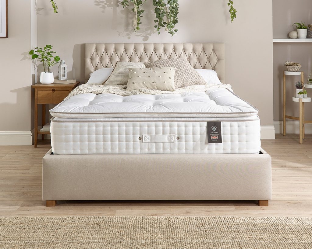 Aspire 7000 Pillowtop mattress on a beige bed, seen from the front