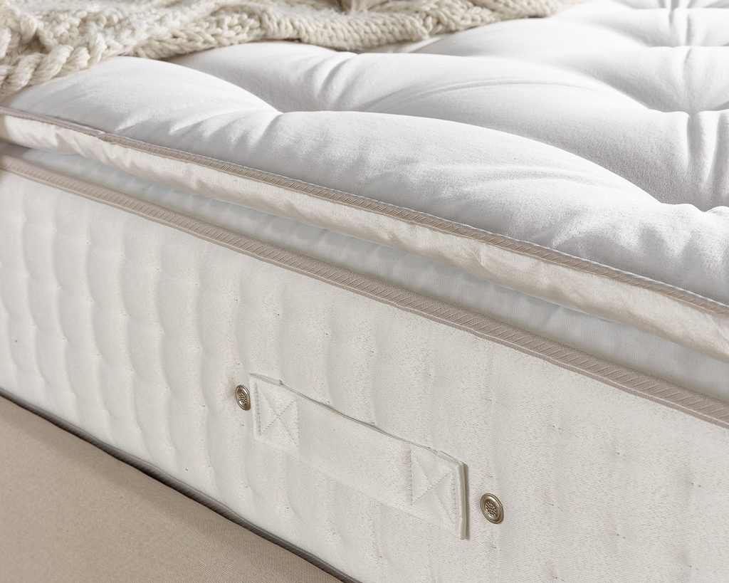 Aspire 7000 Pillowtop mattress, close-up of the pillowtop, tufting and side handle