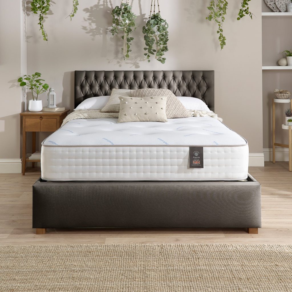 Aspire 7000 Pocket Climate Cool Wool Dual Sided mattress on a charcoal bed, front view