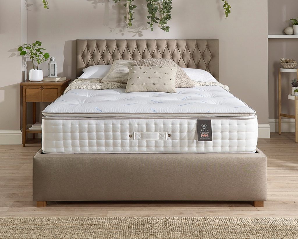 Aspire 7000 Pocket Climate Cool Wool Pillowtop seen from the foot of a taupe bed