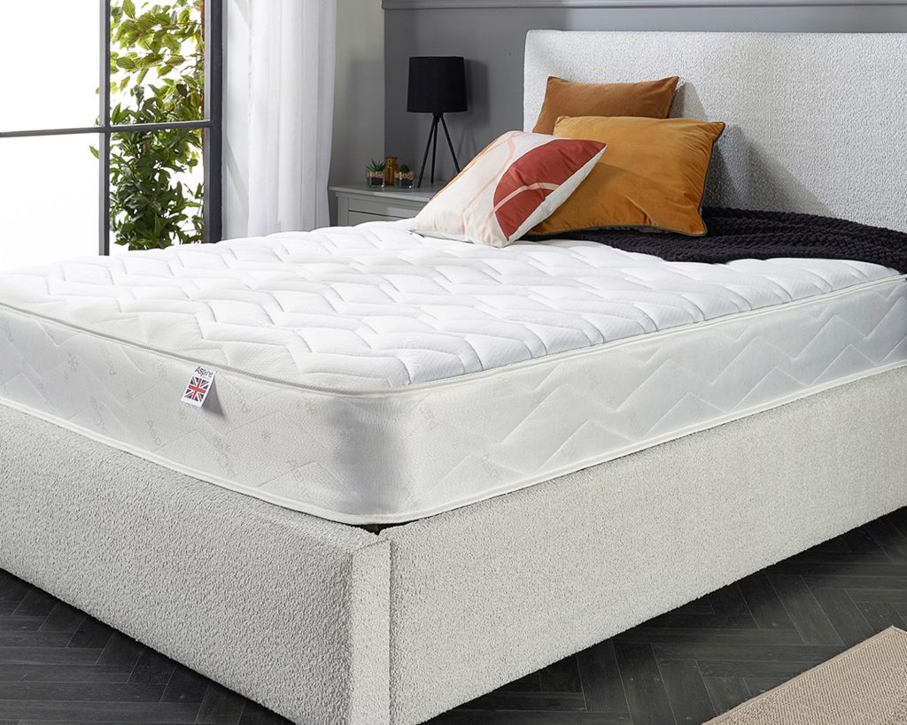Aspire Double Comfort Memory Rolled Mattress on a cream boucle bed