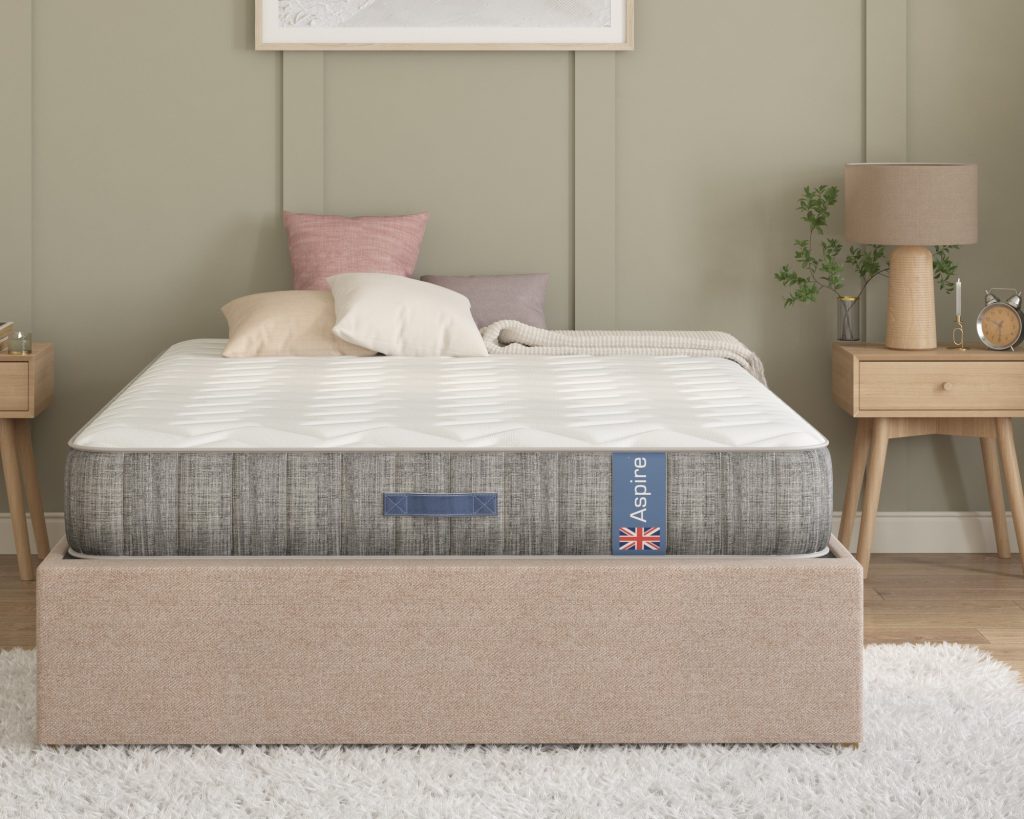 Aspire Natural Wool Pocket Eco Hybrid mattress on a beige bed, seen from the front