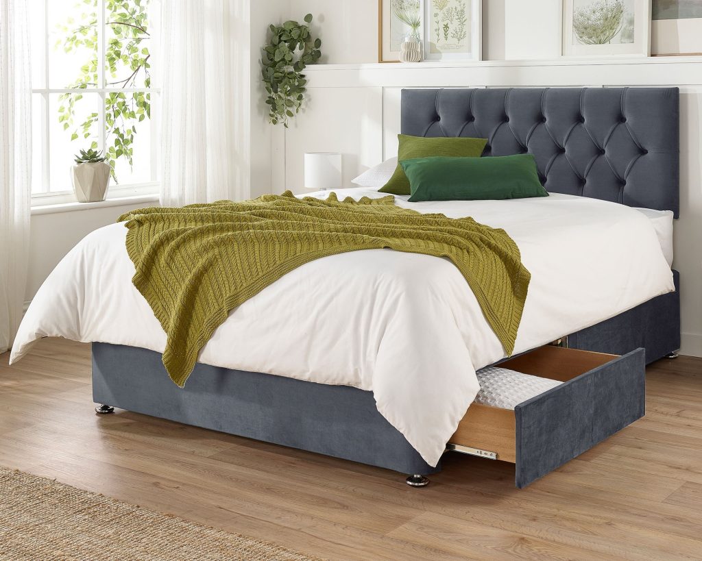 Aspire Olivier Divan Bed Set in grey velvet with an open drawer in a bedroom