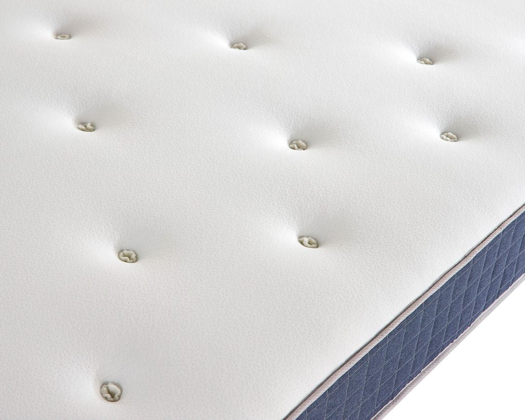 Hand-tufted top of the Aspire Pocket+ 1000 Duo Tufted Dual Sided Mattress