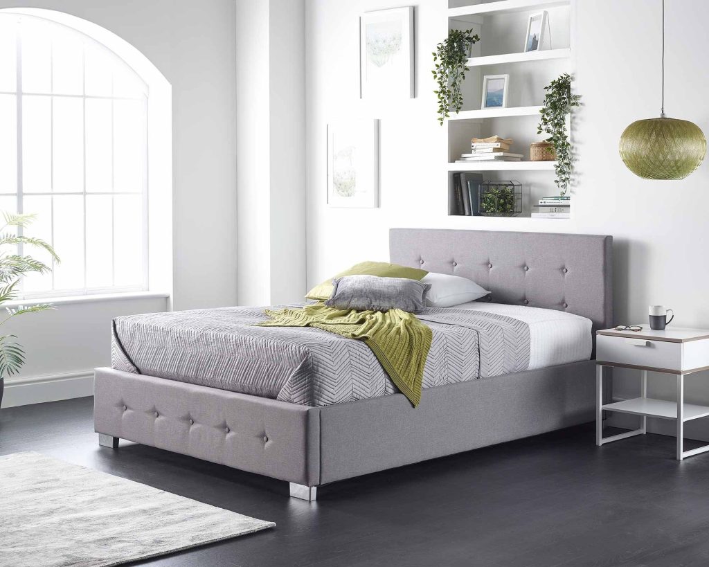 Aspire Side Opening Ottoman Storage Bed in grey linen in a bright bedroom