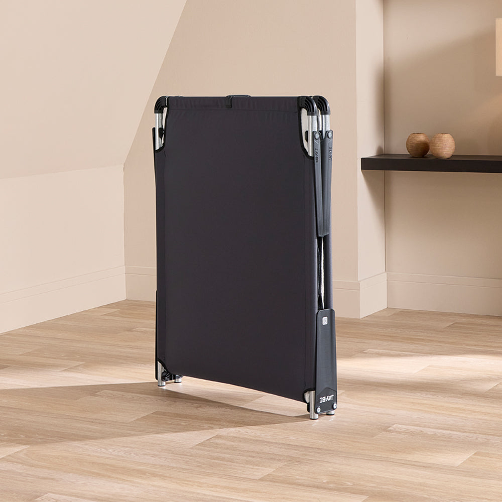 Jay-Be CE70 Compact Folding Bed folded flat and standing upright