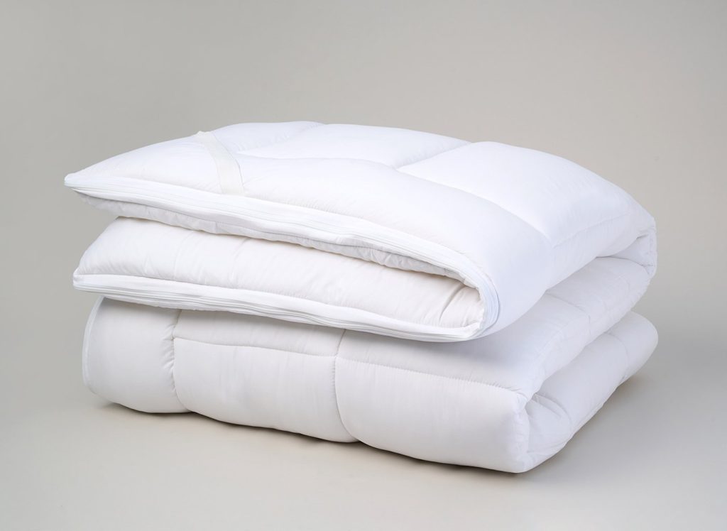 Dream Team Ultimate Washable Mattress Topper folded on a plain background