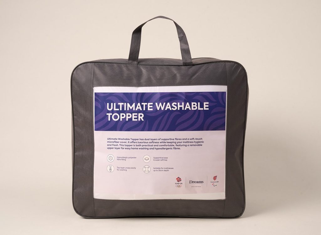 Dream Team Ultimate Washable Mattress Topper in its zipped carry bag