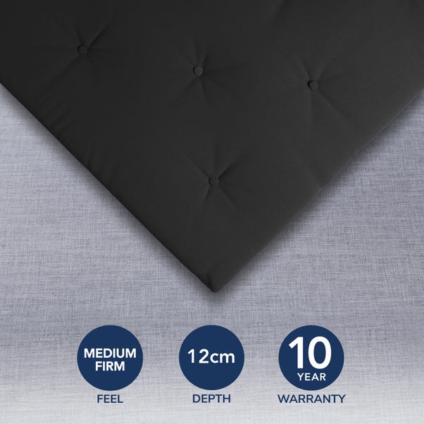 Corner of the Dunelm Mito futon mattress in black cotton blend with button tufting