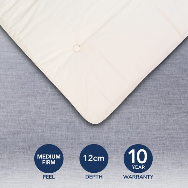 Corner of the Dunelm Mito futon mattress with medium firm, 12cm depth and 10 year warranty badges