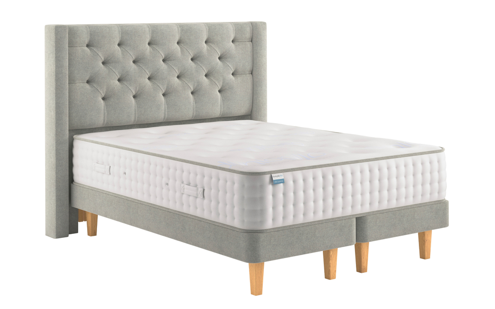 Dunlopillo Elite Supreme mattress on a grey divan on legs with headboard