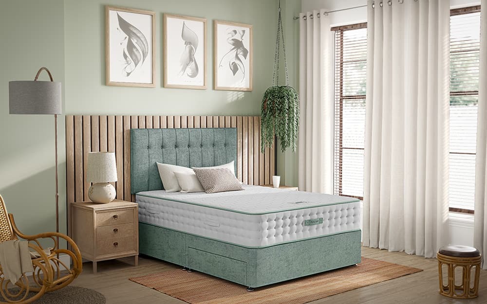Dunlopillo Kareena mattress on a green divan bed in a bright bedroom