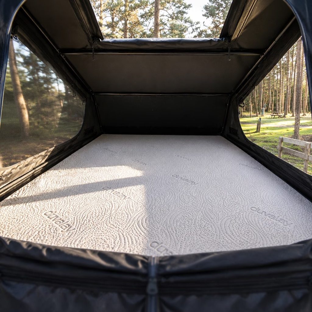Duvalay roof tent mattress topper inside a TentBox Go