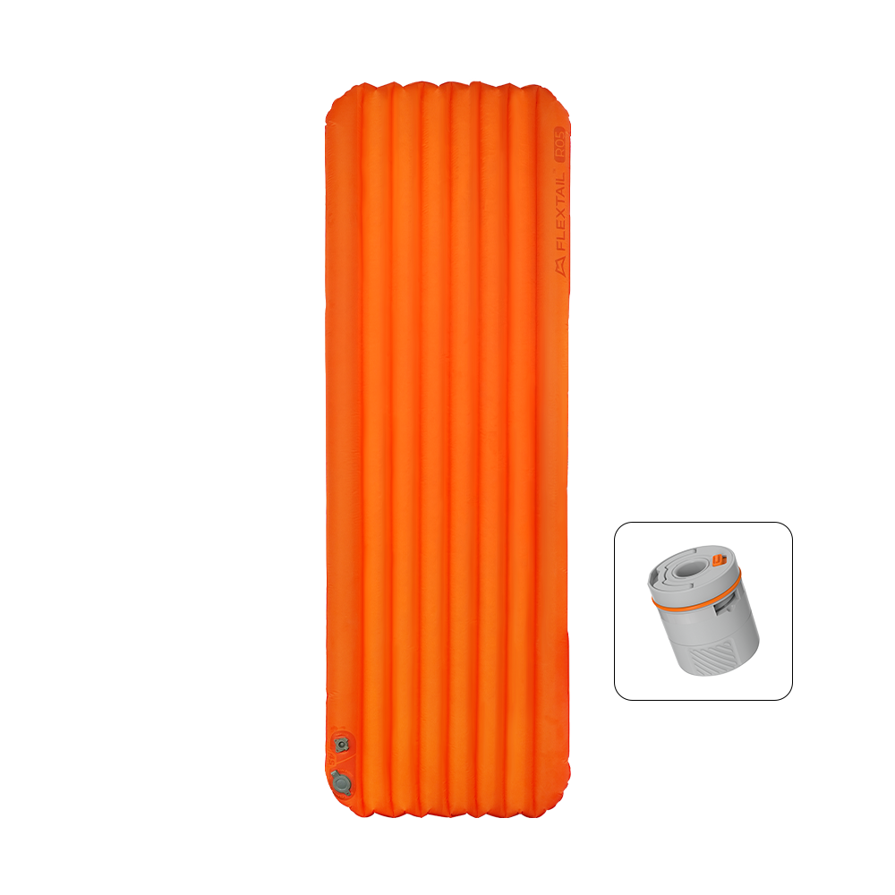 Flextail Tiny Sleeping Pad R05 AVS inflated in orange beside its pump capsule