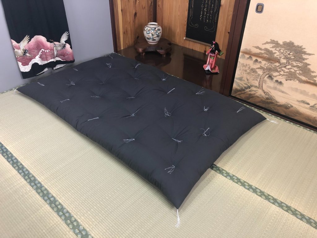 Charcoal Futons from Japan shikibuton with hand tufting laid on tatami