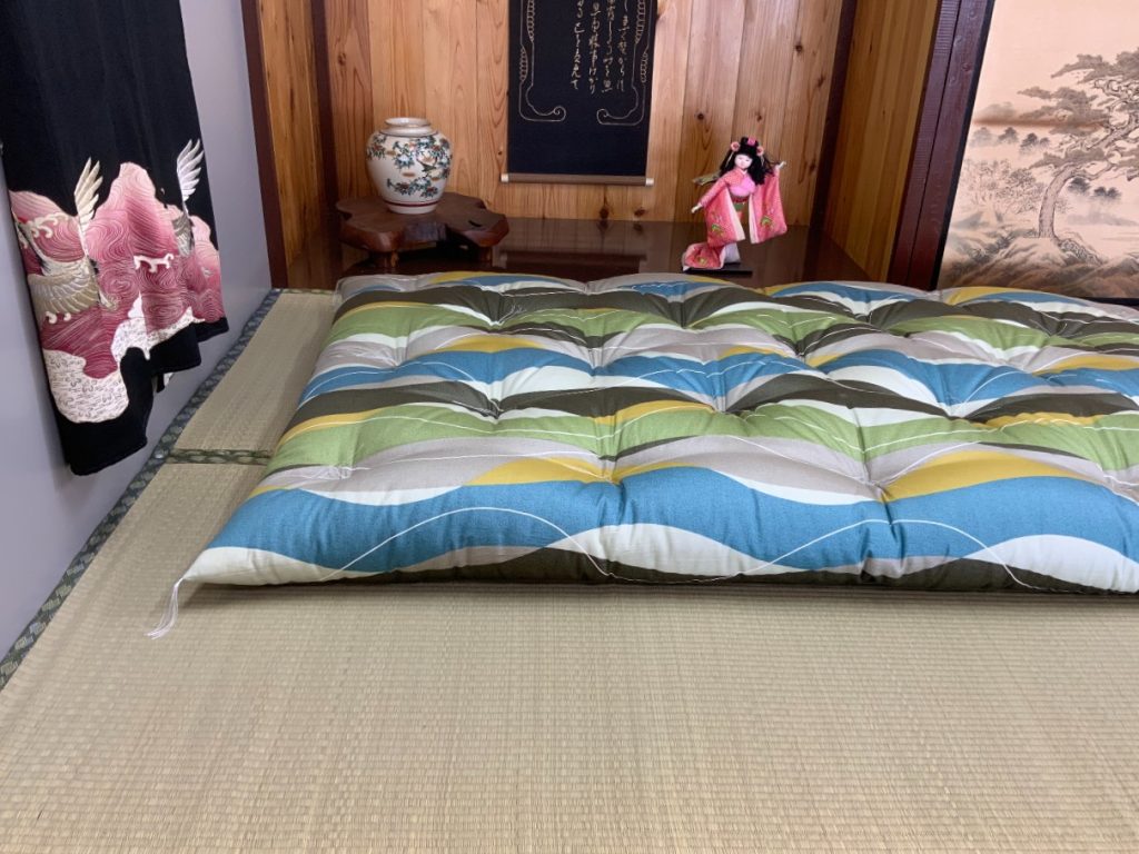 Futons from Japan shikibuton in the colourful Haru print on a tatami floor
