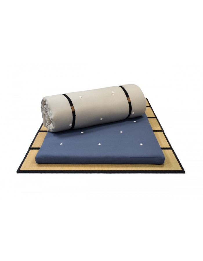 Futons247 Neru bed rolls in blue and clay, one rolled on top of the other