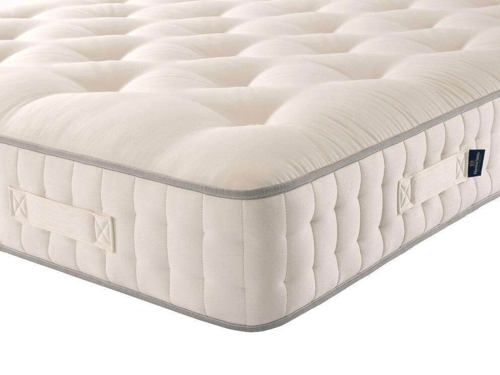 Corner of the Harrison Spinks Bronze Ortho 3500 mattress with tufting and side handles