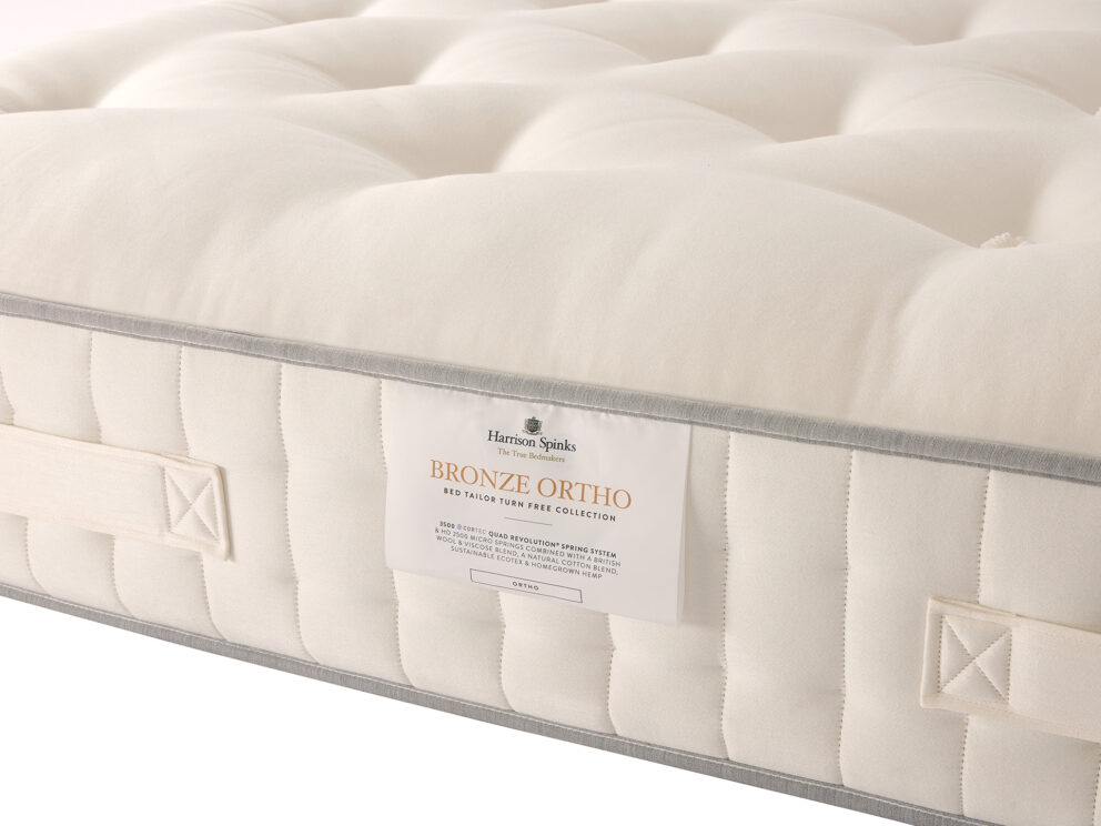 Bronze Ortho label sewn onto the side of the Harrison Spinks mattress