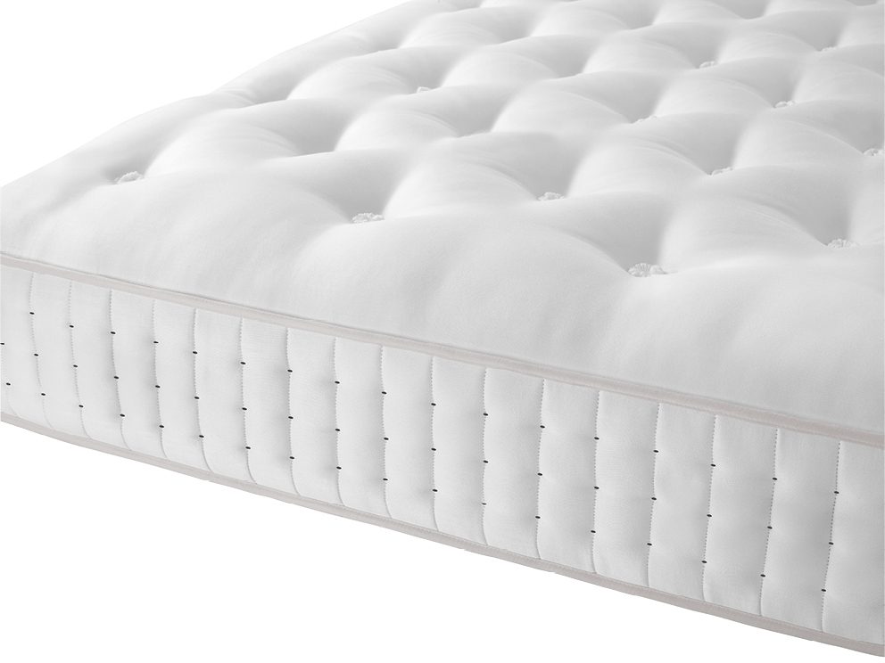 Corner of the Harrison Spinks Clover 3000 mattress showing the tufted top and stitched border