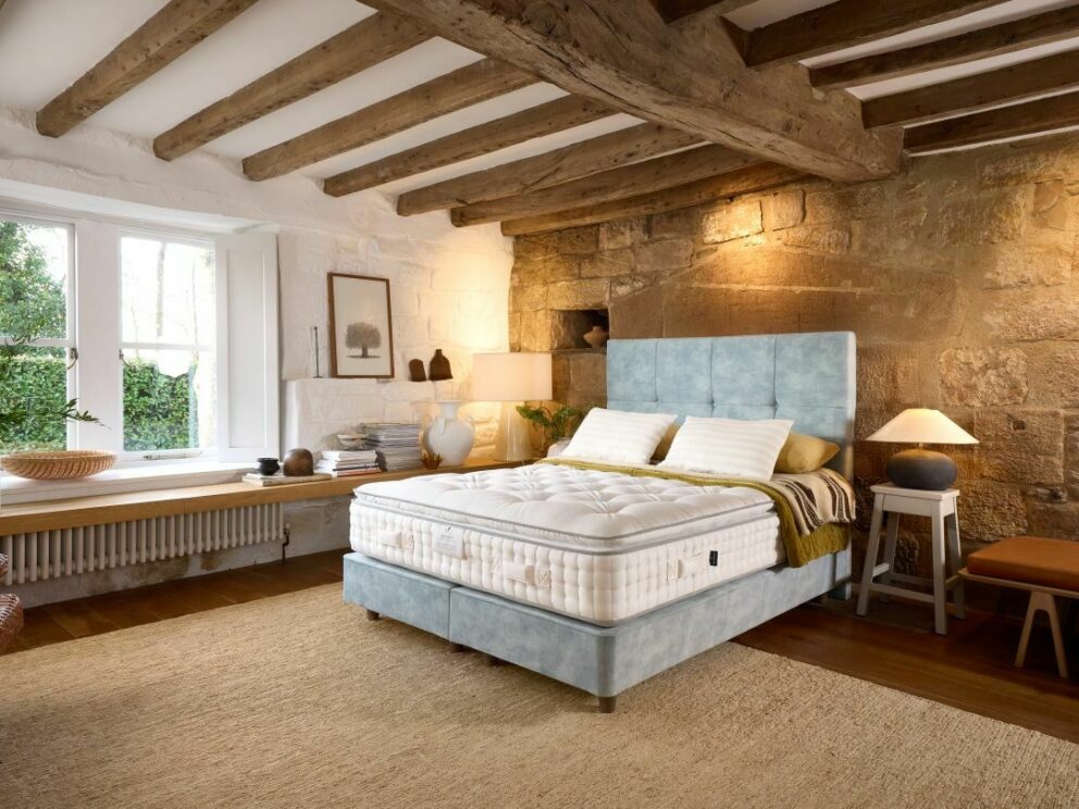 Bedroom with beamed ceiling and a Harrison Spinks Radiant Pillowtop 15000 bed