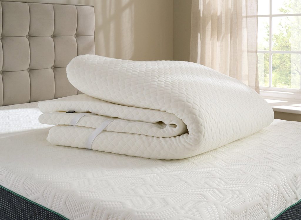 Hyde & Sleep Memory Foam Mattress Topper folded on a mattress