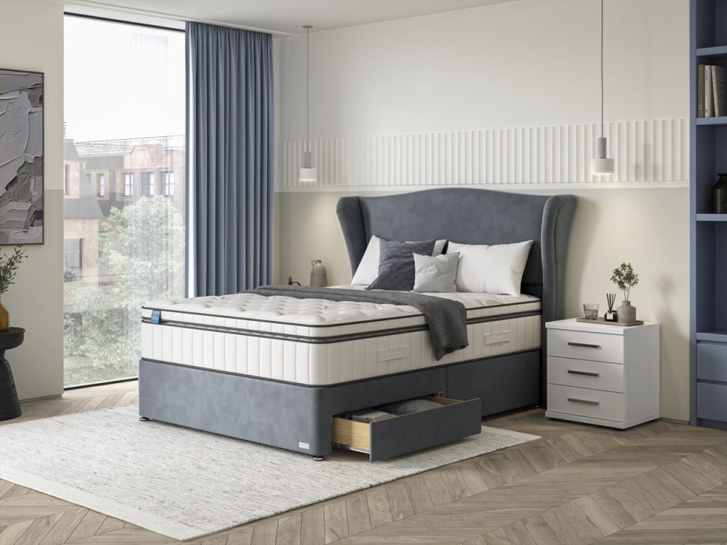 iGel NanoTech 4000i Plushtop on a blue velvet divan bed in a bedroom