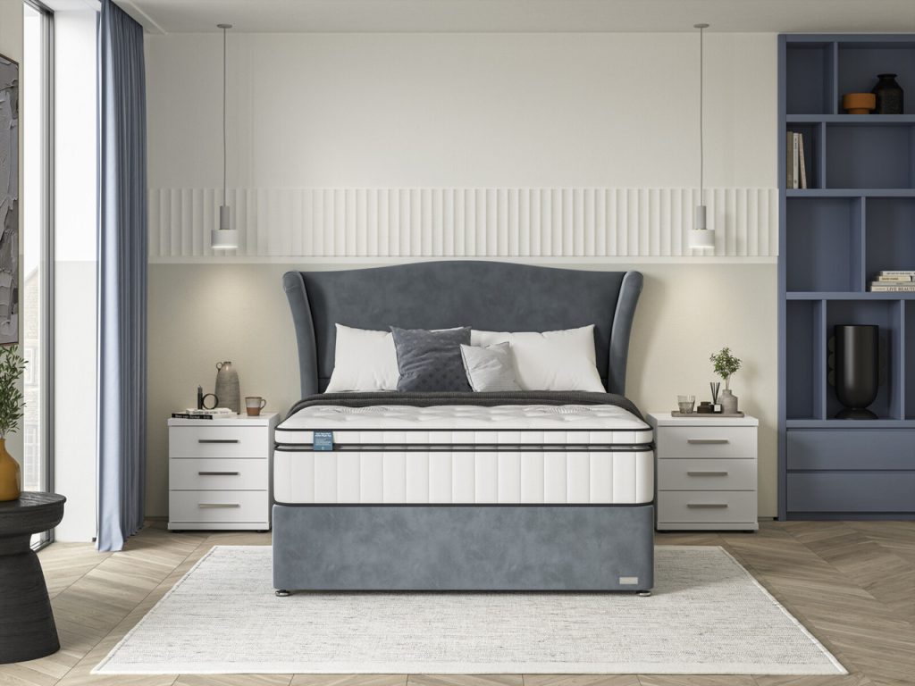 iGel NanoTech 4000i Plushtop on a divan bed, front view beside two bedside tables