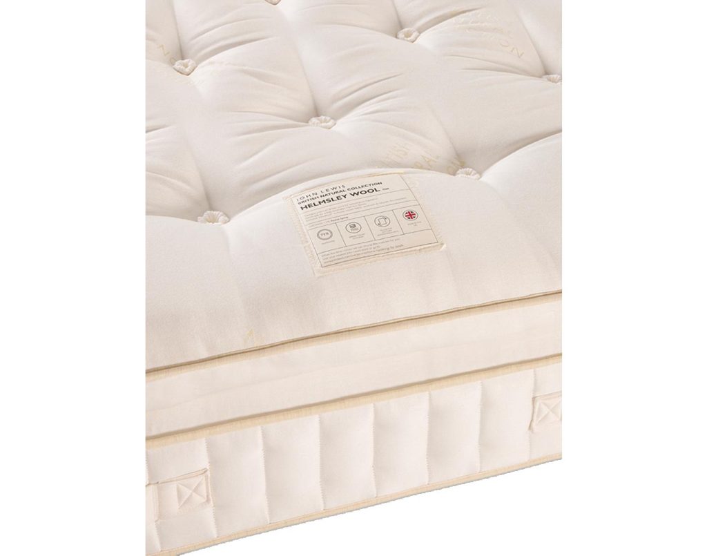 Helmsley Wool Pillowtop corner with wool rosette tufting and label