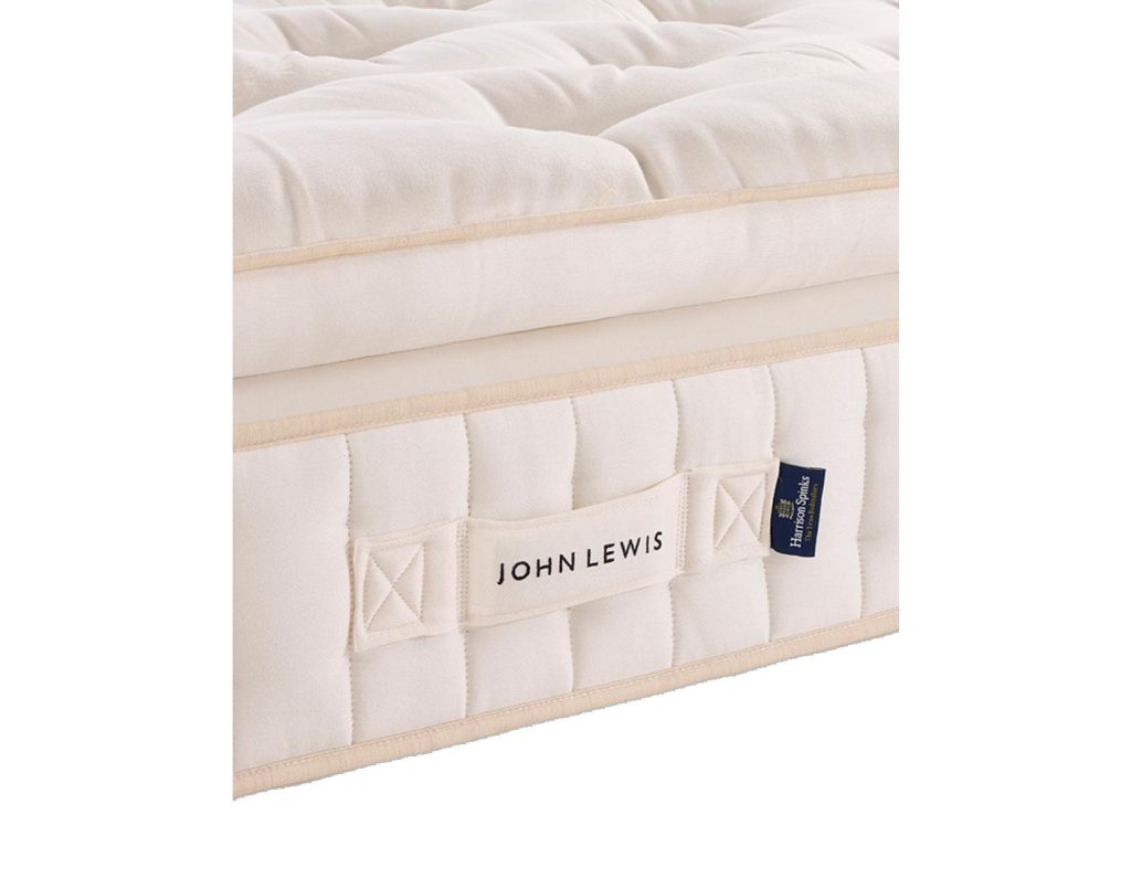 Hand-stitched side panel of the Helmsley Wool Pillowtop with John Lewis badge