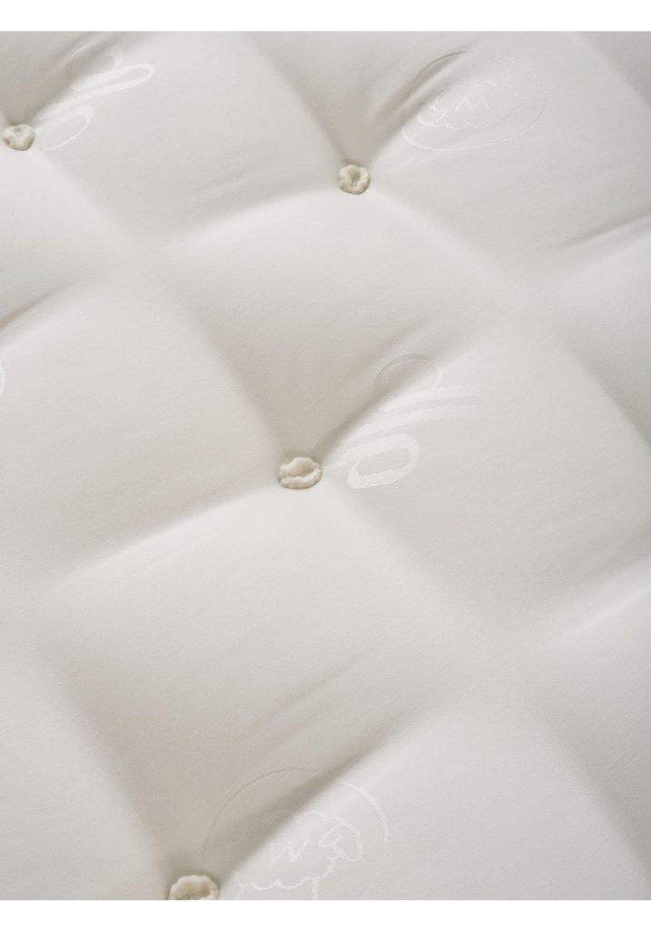 Close-up of the tufted Waitrose Wool 1800 sleep surface