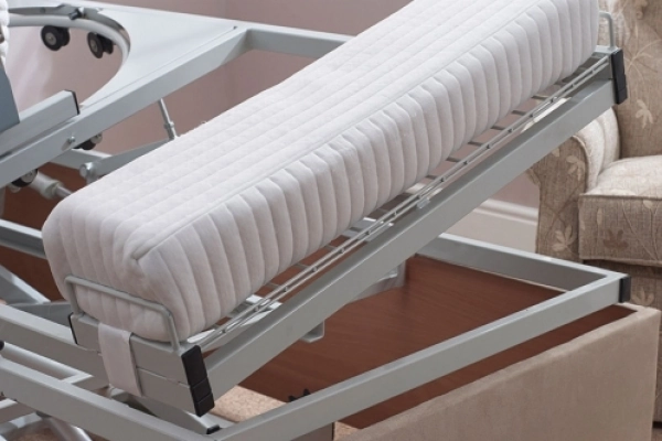 Close-up of the Laybrook turning bed mattress on its rotating steel frame