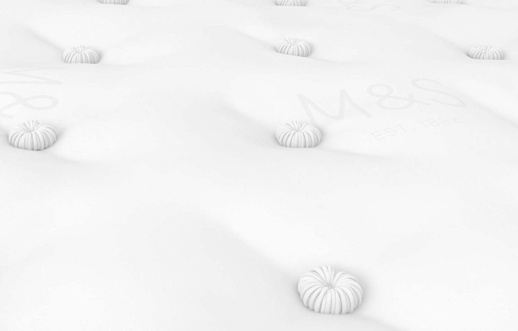 M&S 3500 British Wool Firm Mattress, close-up of the tufted cotton top