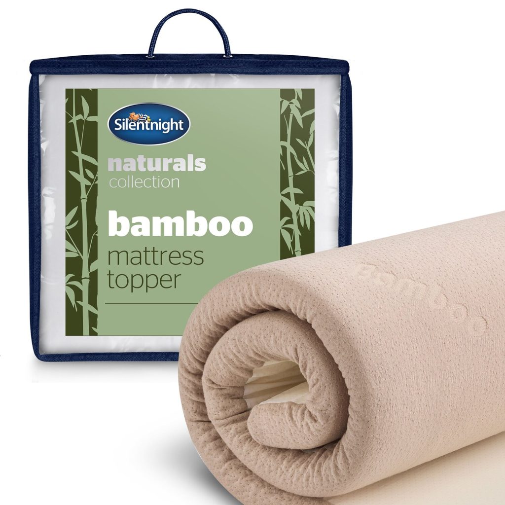 Silentnight Naturals Bamboo mattress topper rolled beside its carry bag