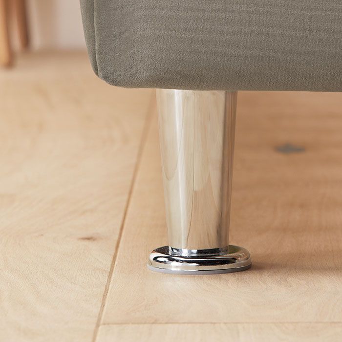 Chrome leg of the Silentnight Fara Upholstered Bed Frame on a wooden floor