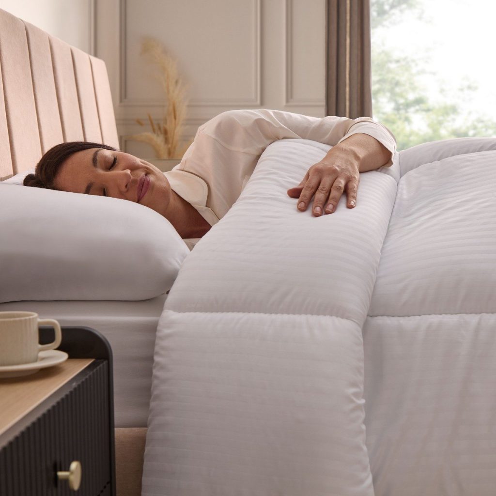 Woman asleep under the Silentnight Hotel Collection duvet