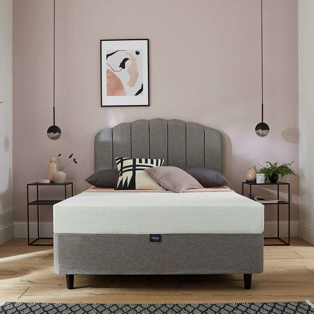 Silentnight Memory Foam Rolled mattress on an upholstered bed in a bedroom