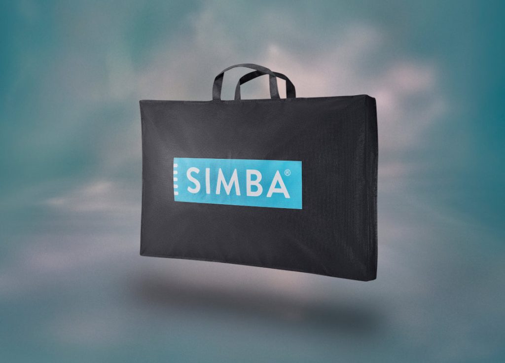 Black Simba storage bag with handles that the AeroDown Pillow comes in