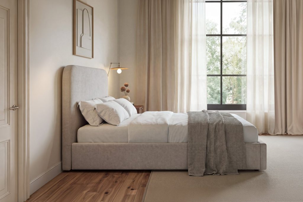 Simba Alderley Ottoman Bed seen from the side in a bedroom