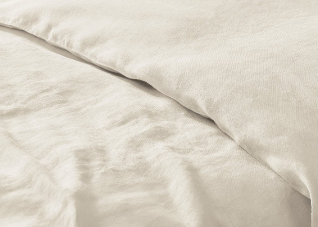 Simba Cool Linen Duvet Cover on a made bed, close view of the fabric
