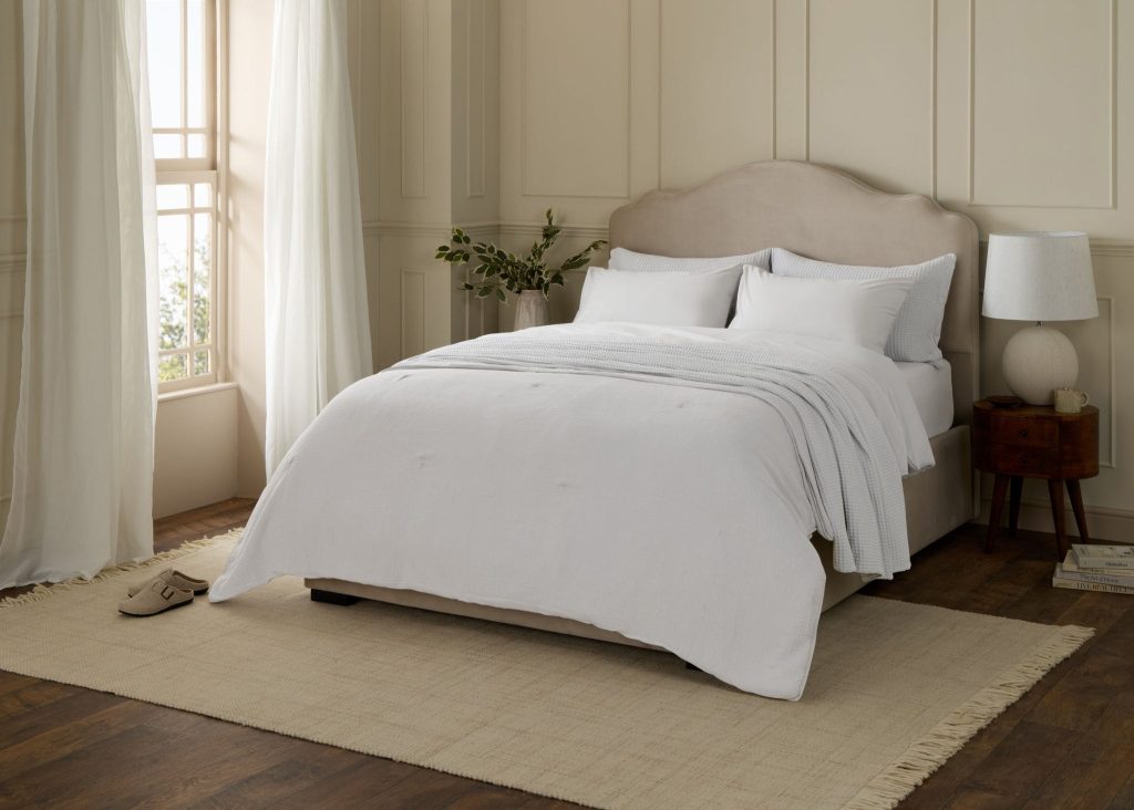 Bedroom styled with Simba Cotton Percale bedding on an upholstered bed