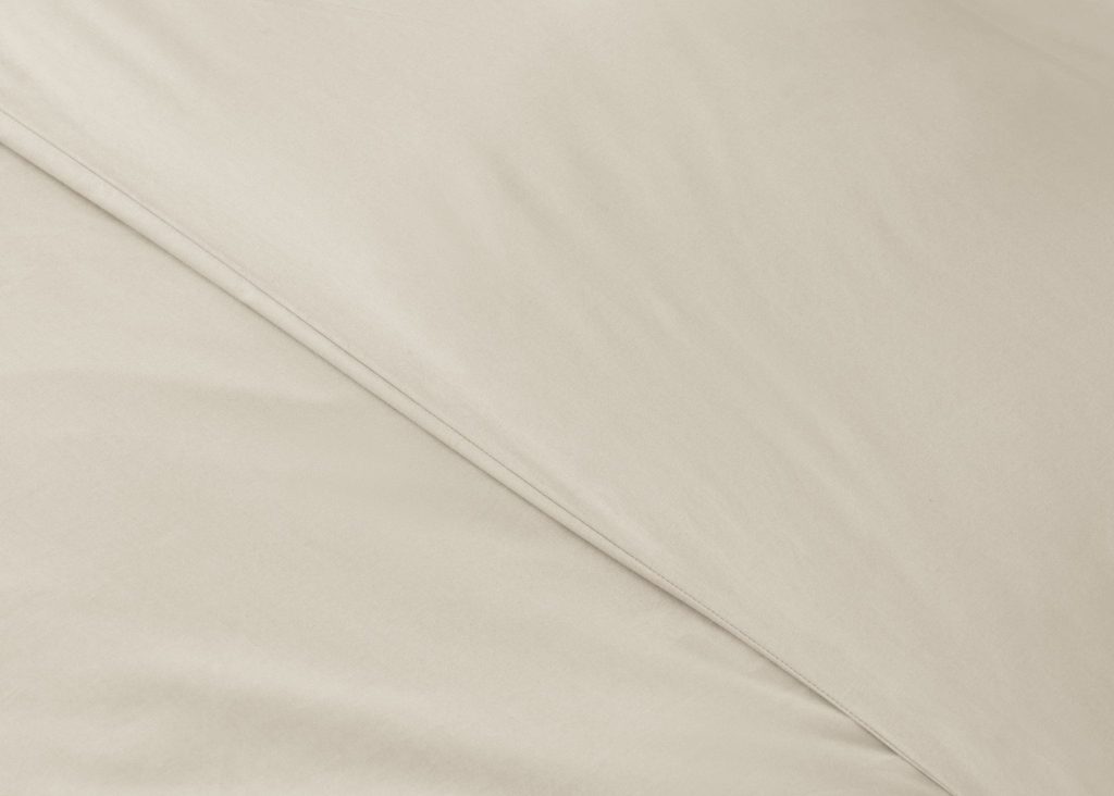 Simba Cotton Percale Duvet Cover on a made bed, close view of the fabric